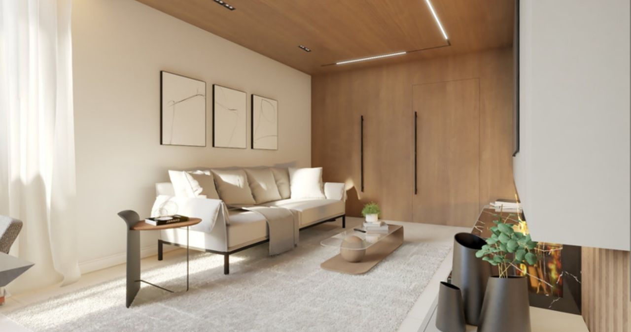 Sala de estar com sofá claro, forro em madeira, quadros em linha e painel de madeira